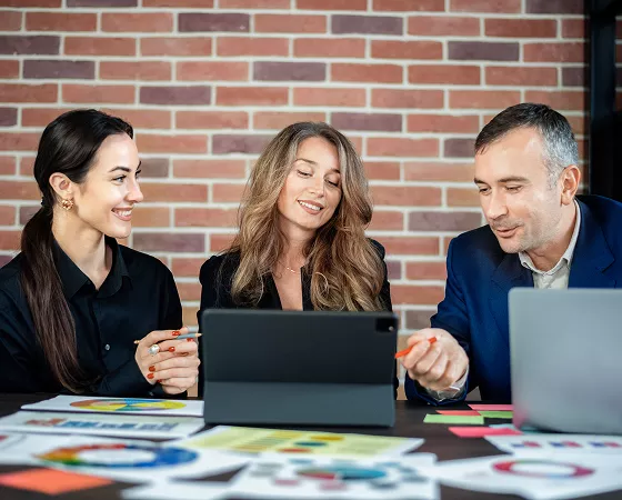 Sales team discussing a client relationship strategy