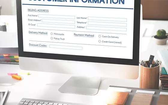 Sales team reviewing new leads in a CRM dashboard